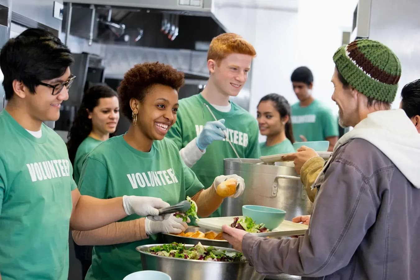 Volunteers serving meals