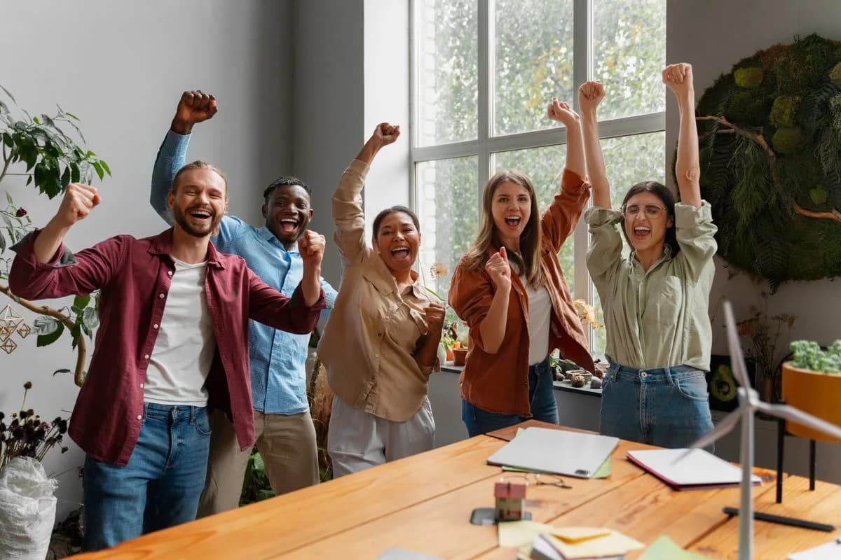 Colleagues cheering together