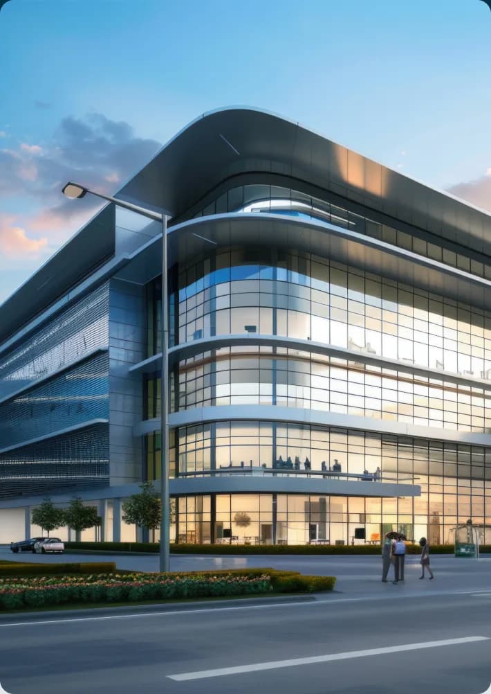 Modern glass office building at dusk