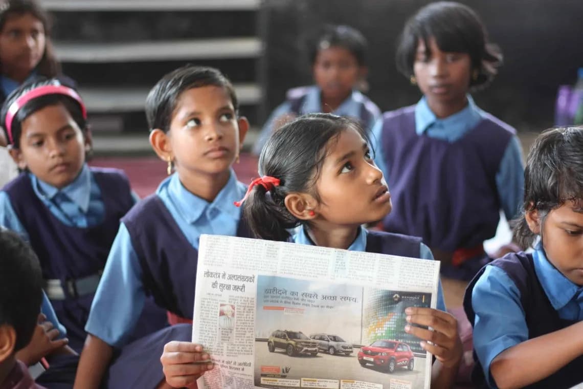 School children reading together