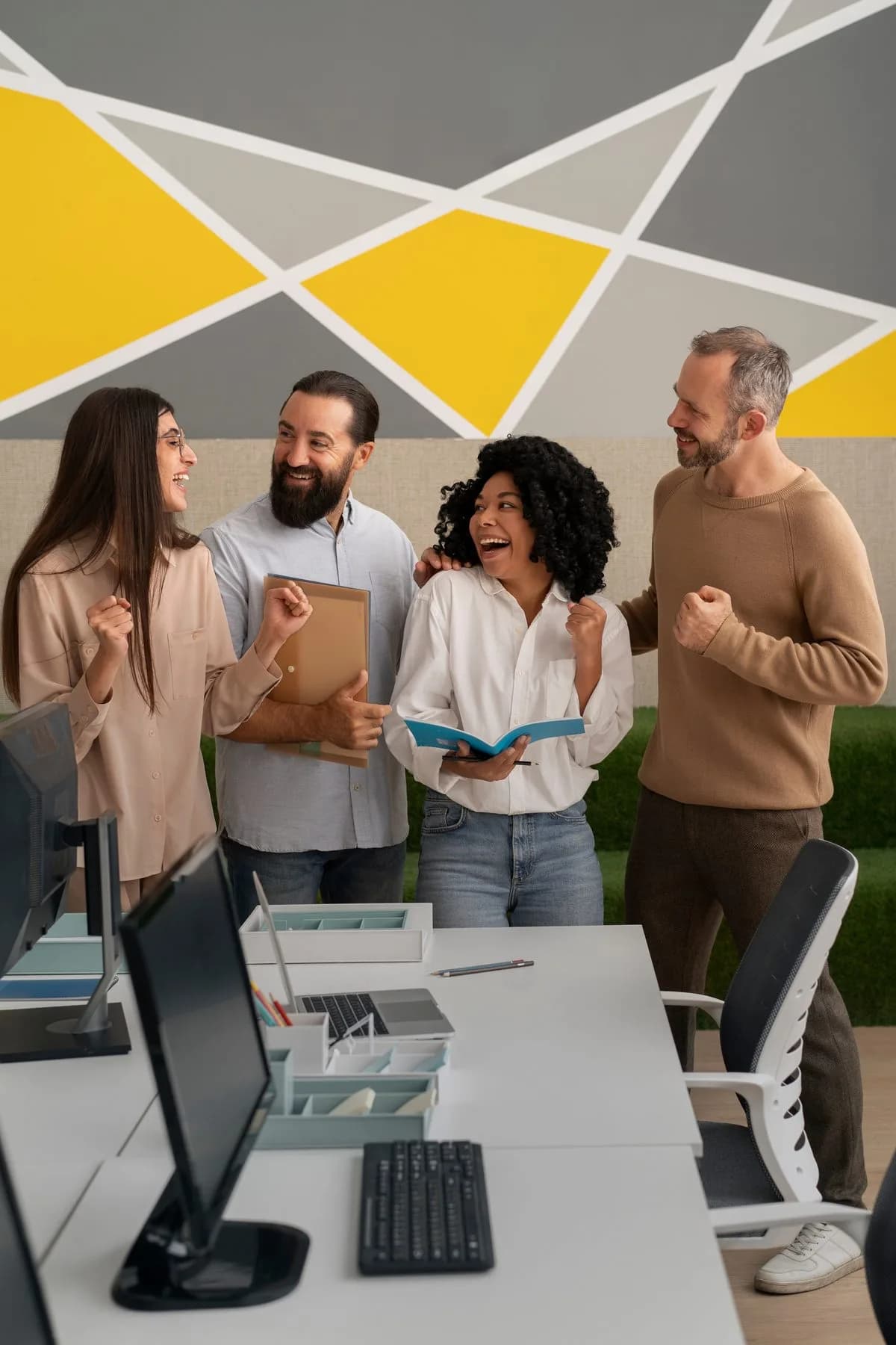Coworkers sharing good news